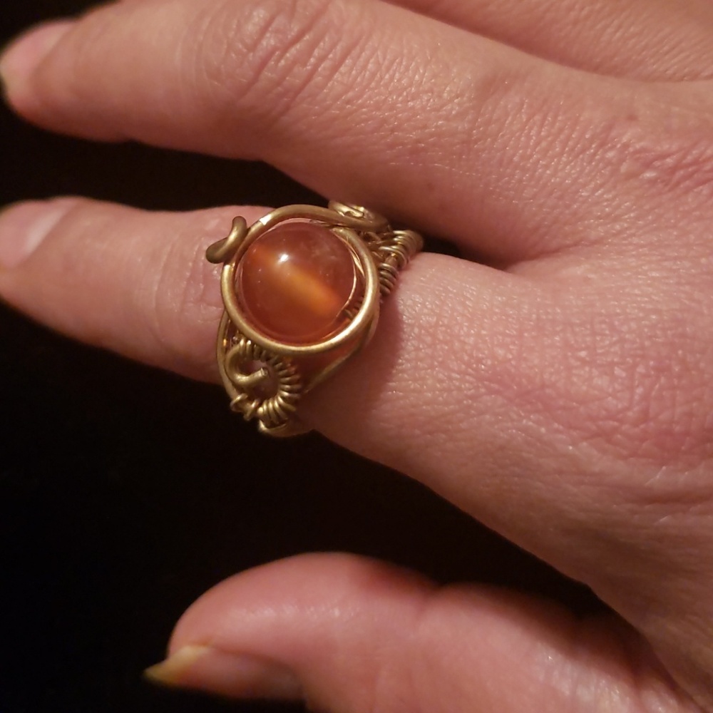 Amber ring and other's stones